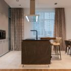 modern design and functionality, where every element flows effortlessly into the living space. Clean lines, high-end finishes, and spacious countertops create a bright and inviting atmosphere. The island, often the centerpiece, serves as both a cooking area and a casual gathering spot. Open shelving or sleek cabinetry keeps everything within reach, while large windows flood the space with natural light. The open layout encourages connection and conversation, making it the perfect place for both culinary creativity and social gatherings.